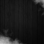 smoke on black wooden background